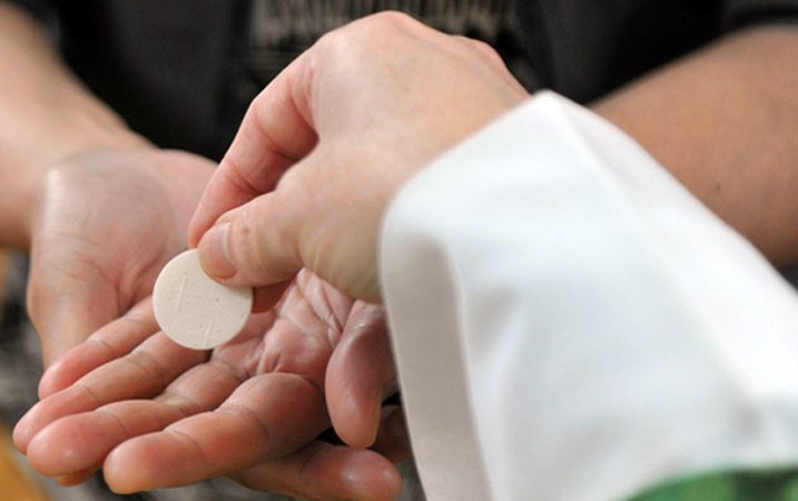 John Calvin and Communion in the Hand - Where Peter Is